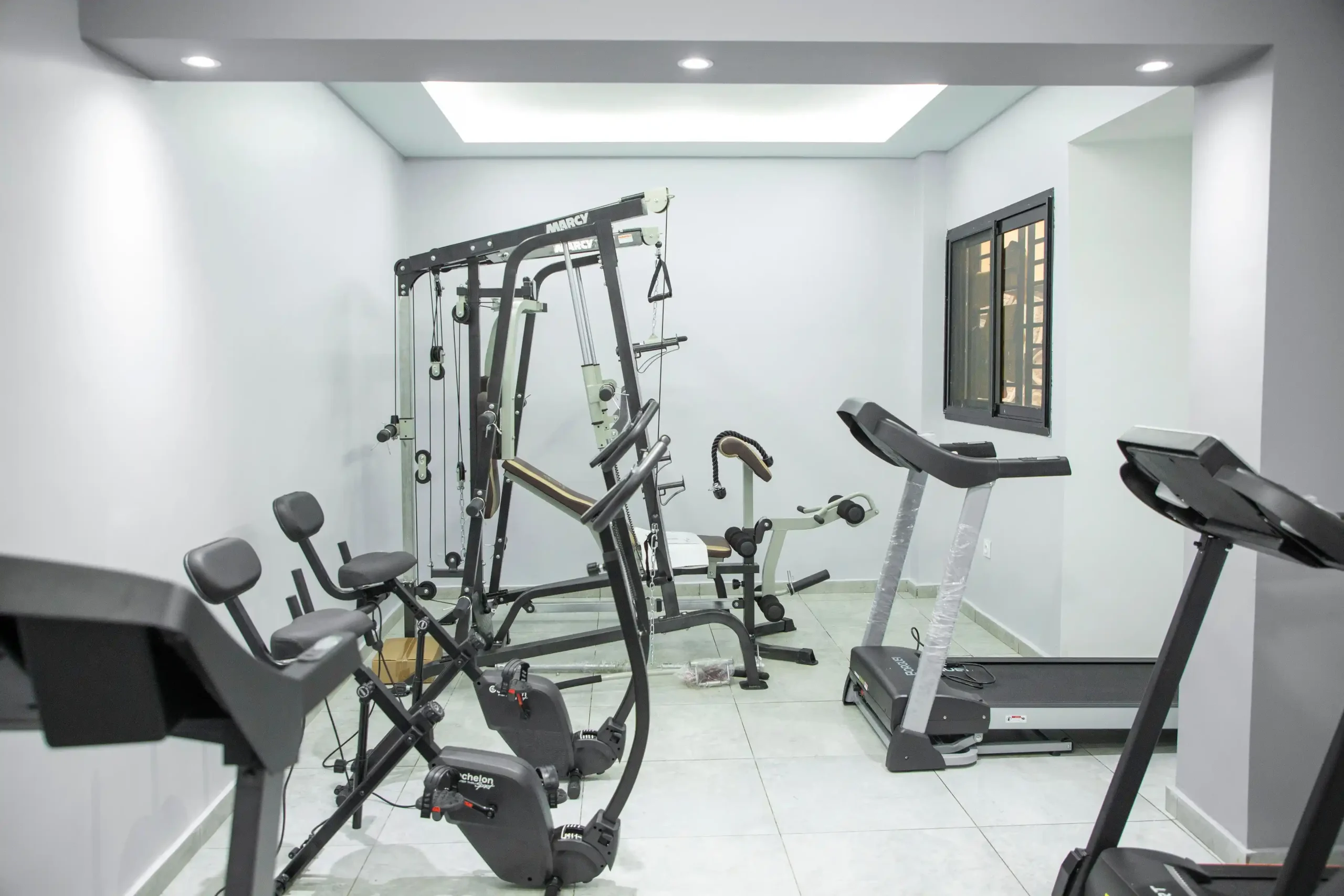 Spacious gym and fitness centre at Ethan Palace serviced apartments Yaoundé